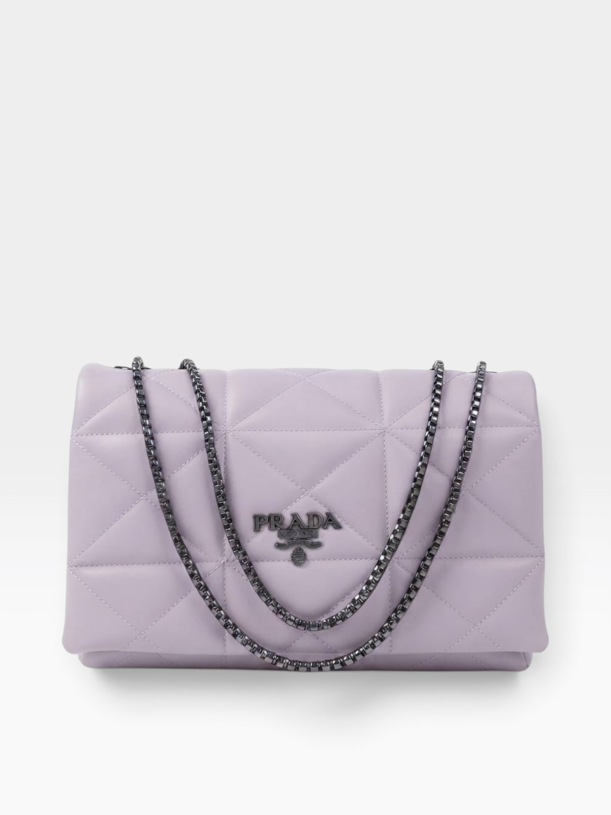 A light purple Prada quilted shoulder bag with a silver-tone chain strap and a silver-tone metal logo plaque on the front.