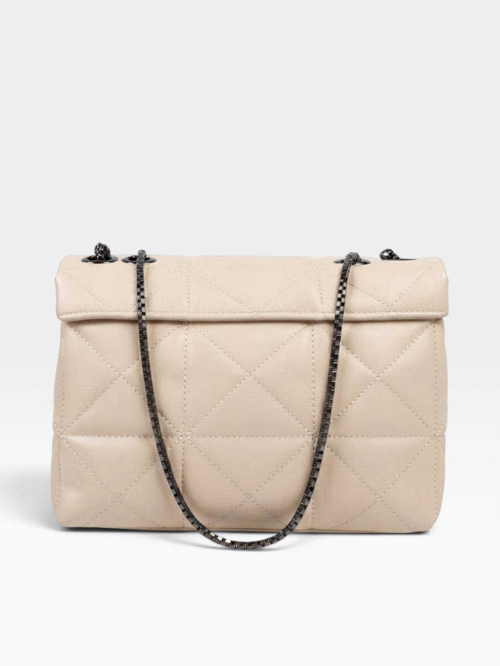 A light beige quilted leather handbag with a flap top and a black chain strap, photographed against a clean white background.
