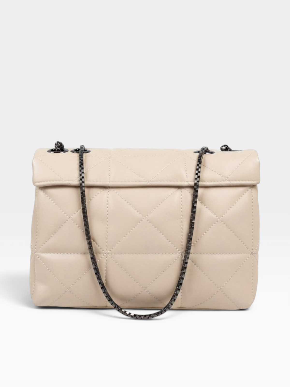 A light beige quilted leather handbag with a flap top and a black chain strap, photographed against a clean white background.