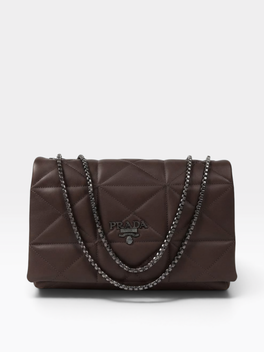 A dark brown Prada quilted leather shoulder bag with a silver-tone chain strap and a central silver-tone logo plaque.