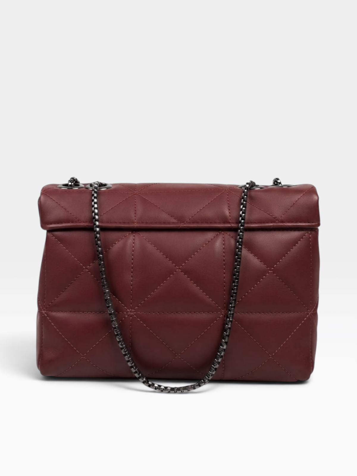 A quilted burgundy leather handbag with a flap top and a black chain strap, photographed against a light gray studio background.